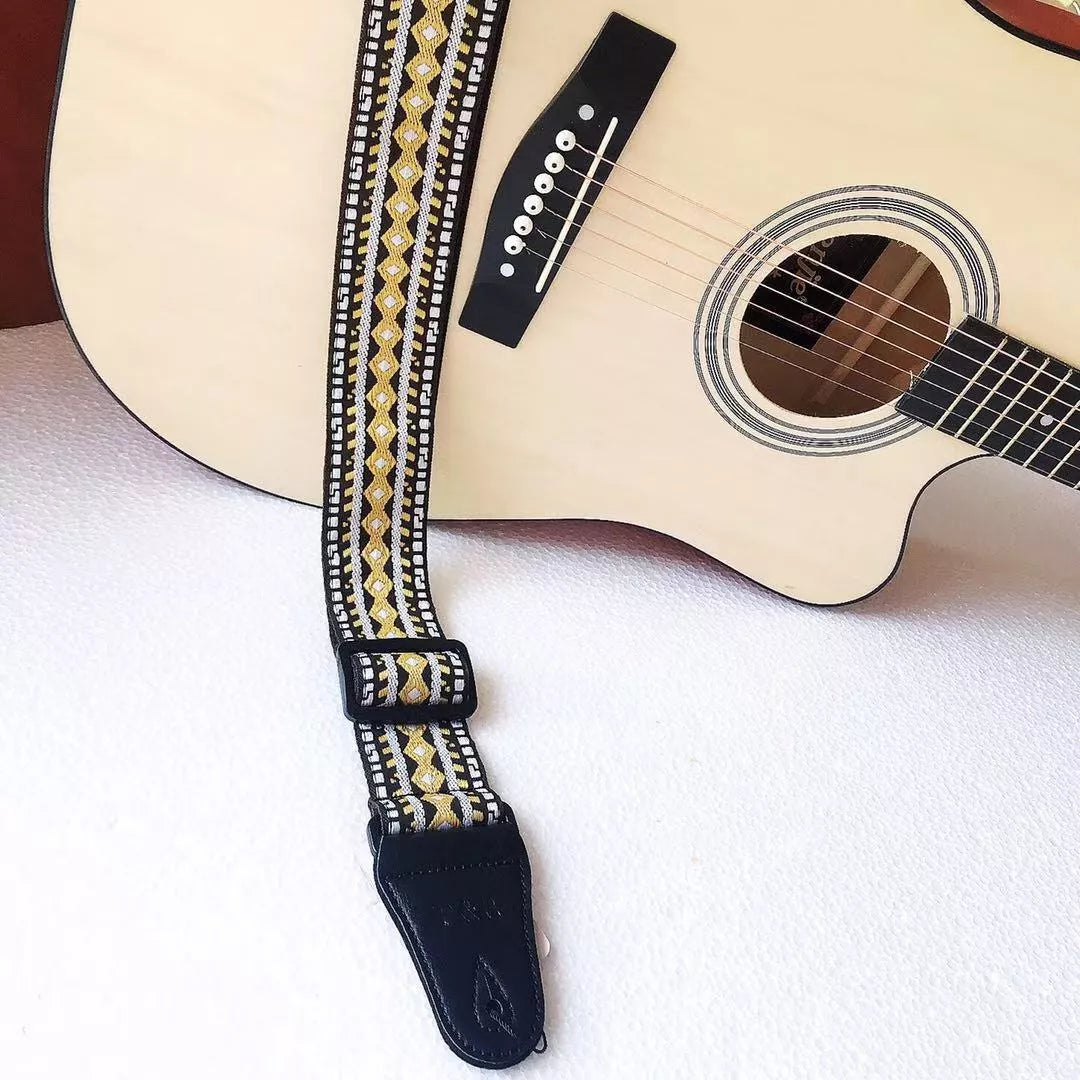 Adjustable embroidered guitar strap with durable webbing