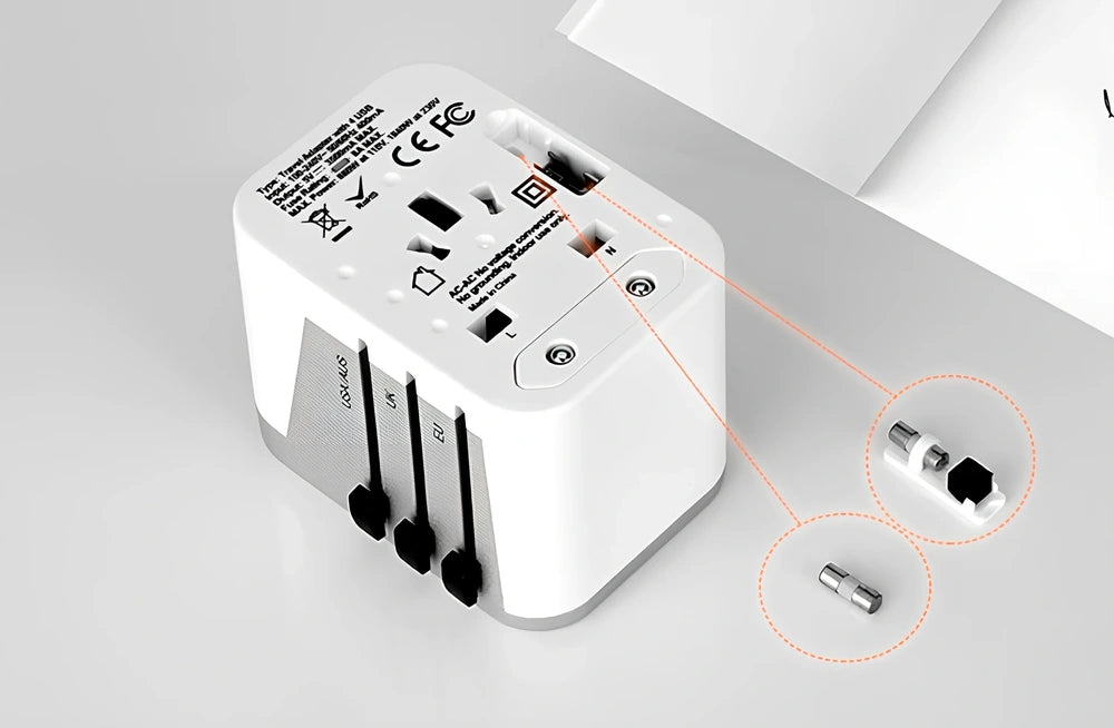 Black multi-country travel adapter 54x68x51mm with universal plugs for 2000W devices in 180 countries