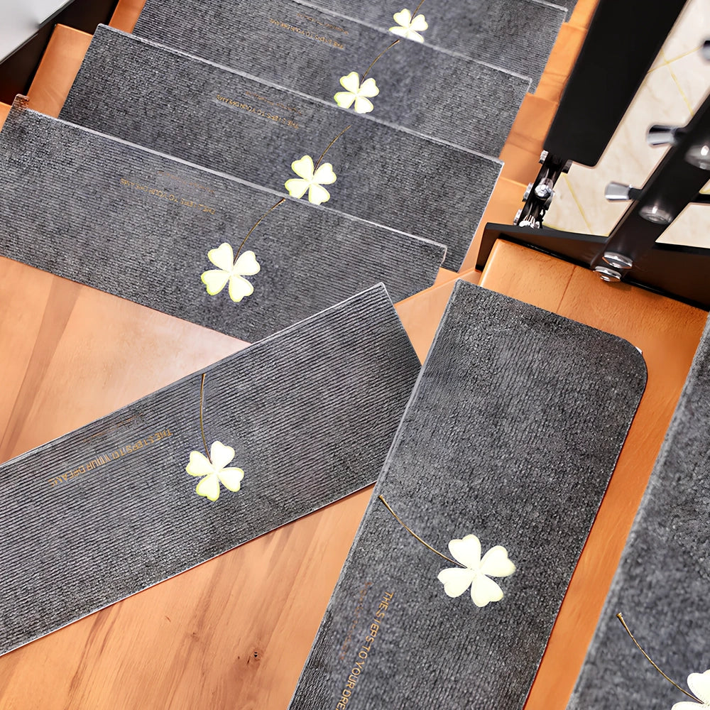 Self-adhesive luminous stair mat with glow strips on wooden staircase, rectangular design with hemmed edges