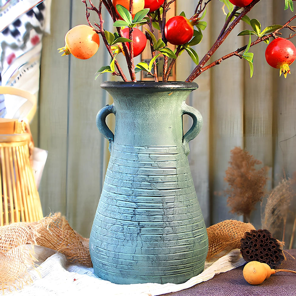Ceramic mosaic vase with dried flowers, showing mosaic pattern and 25cm height