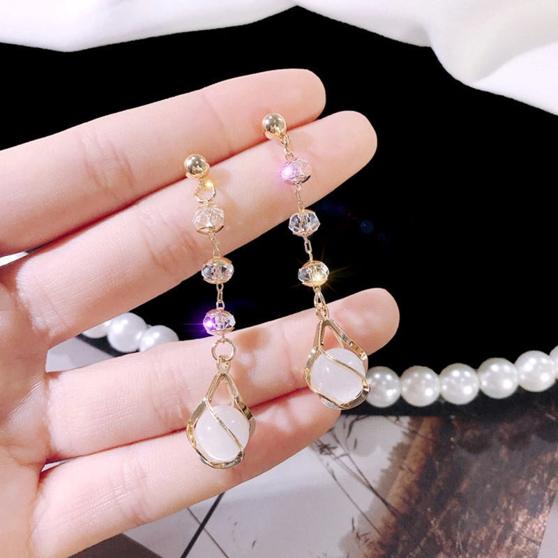 Crystal opal earrings with water drop design