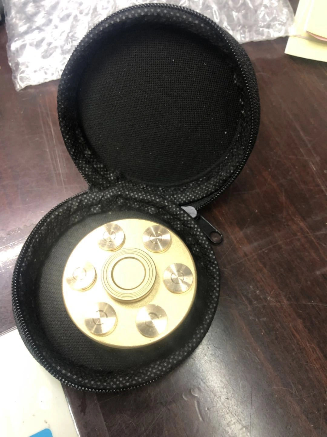 Brass Gun Revolver Bullet Fidget Toy Spinner with Detachable Rotating Feature