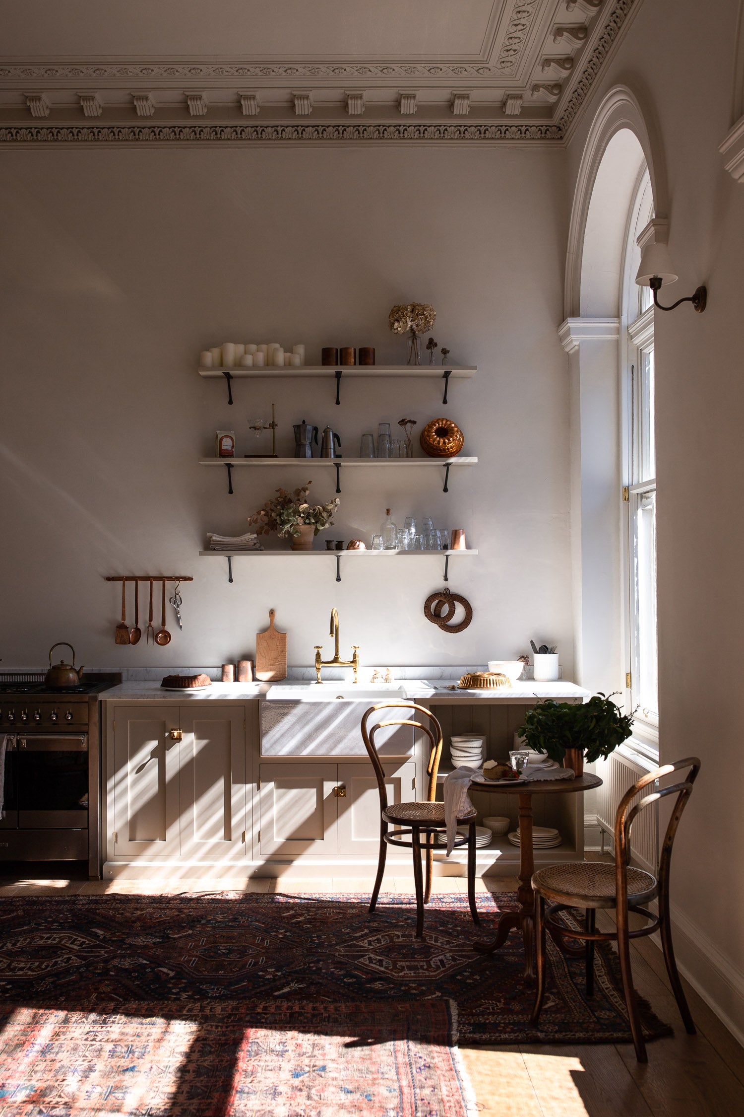 bright timeless kitchen with large windows 