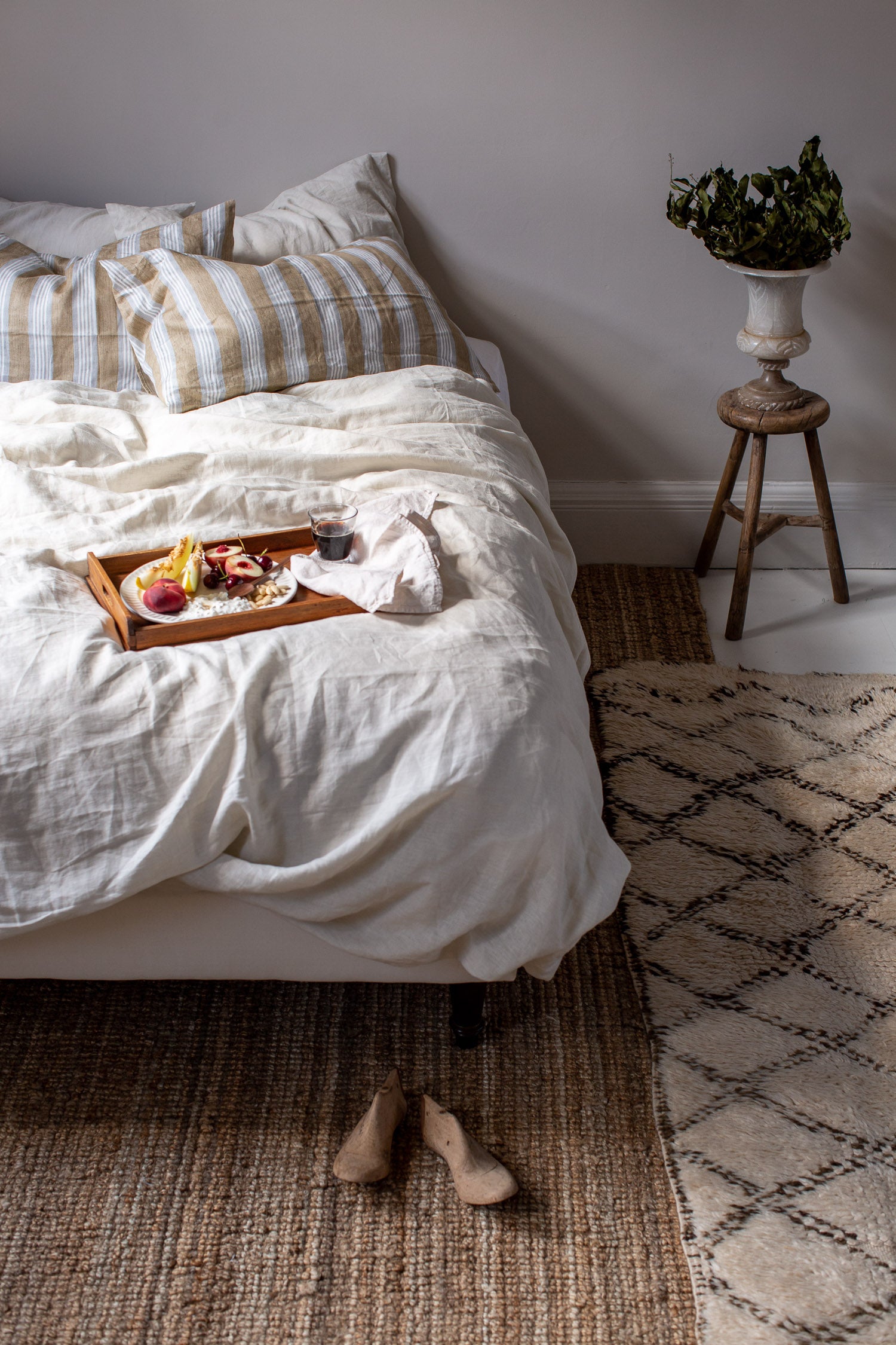 breakfast in bed in natural bedroom