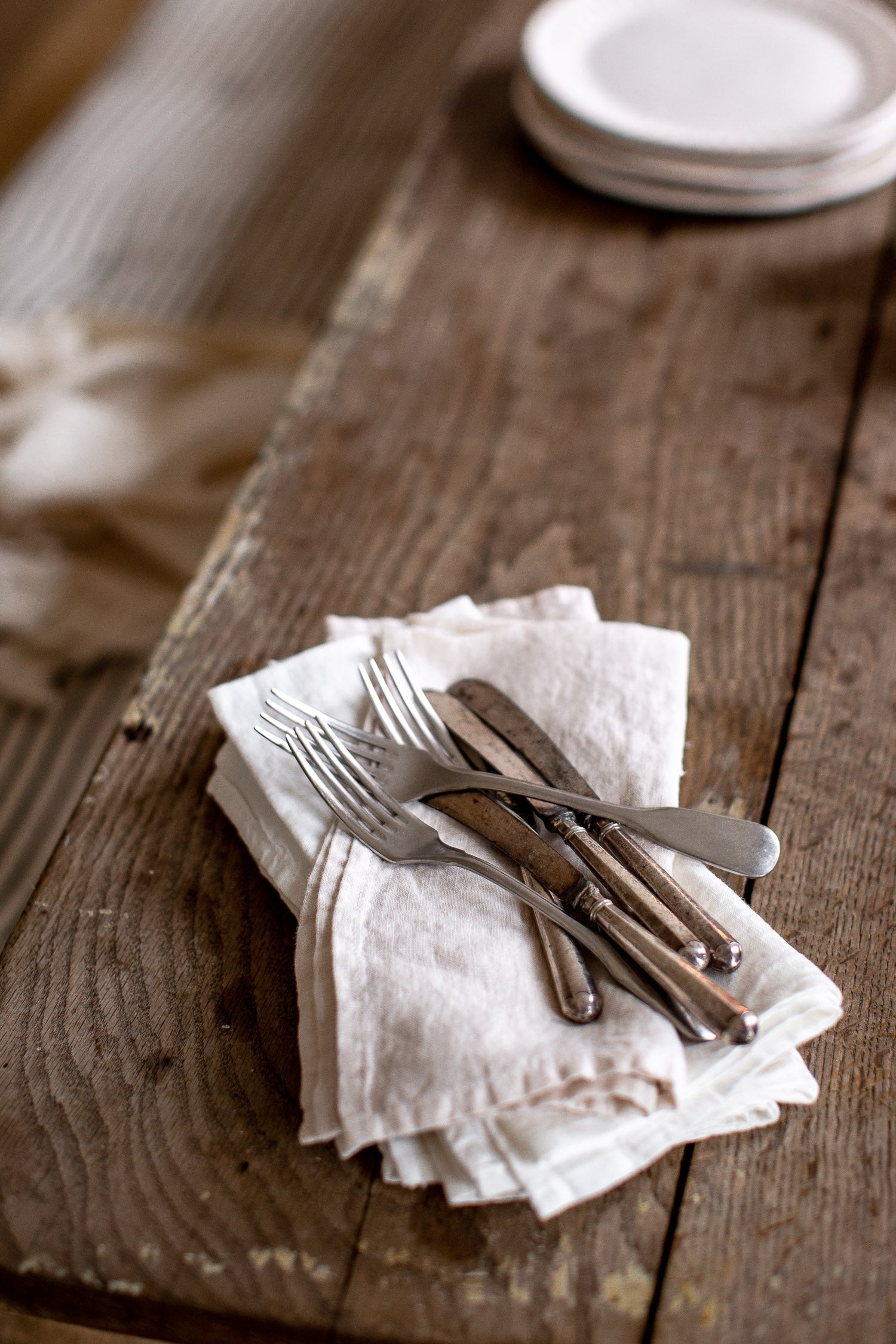 Handmade linen napkins and vinateg cutlery 