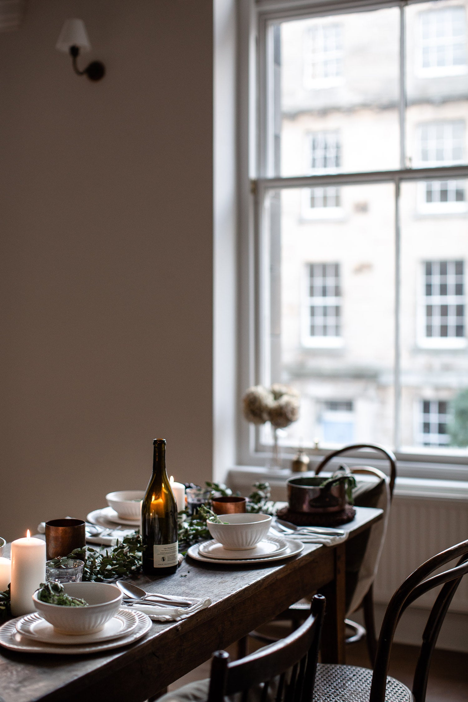 rustic festive table by a big window 