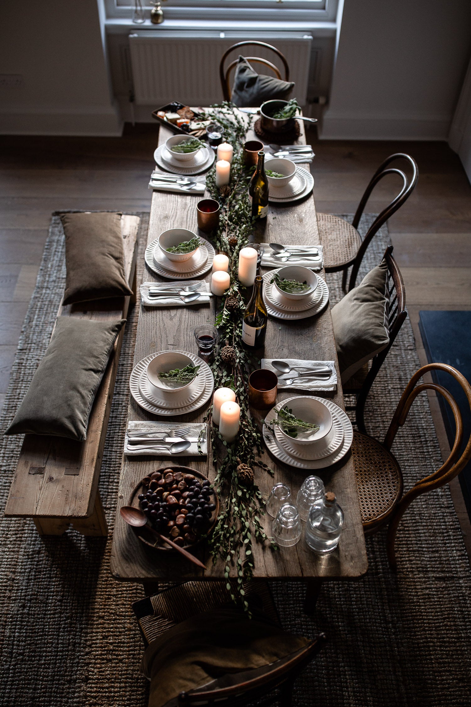 natural festive table with velvet cushions 