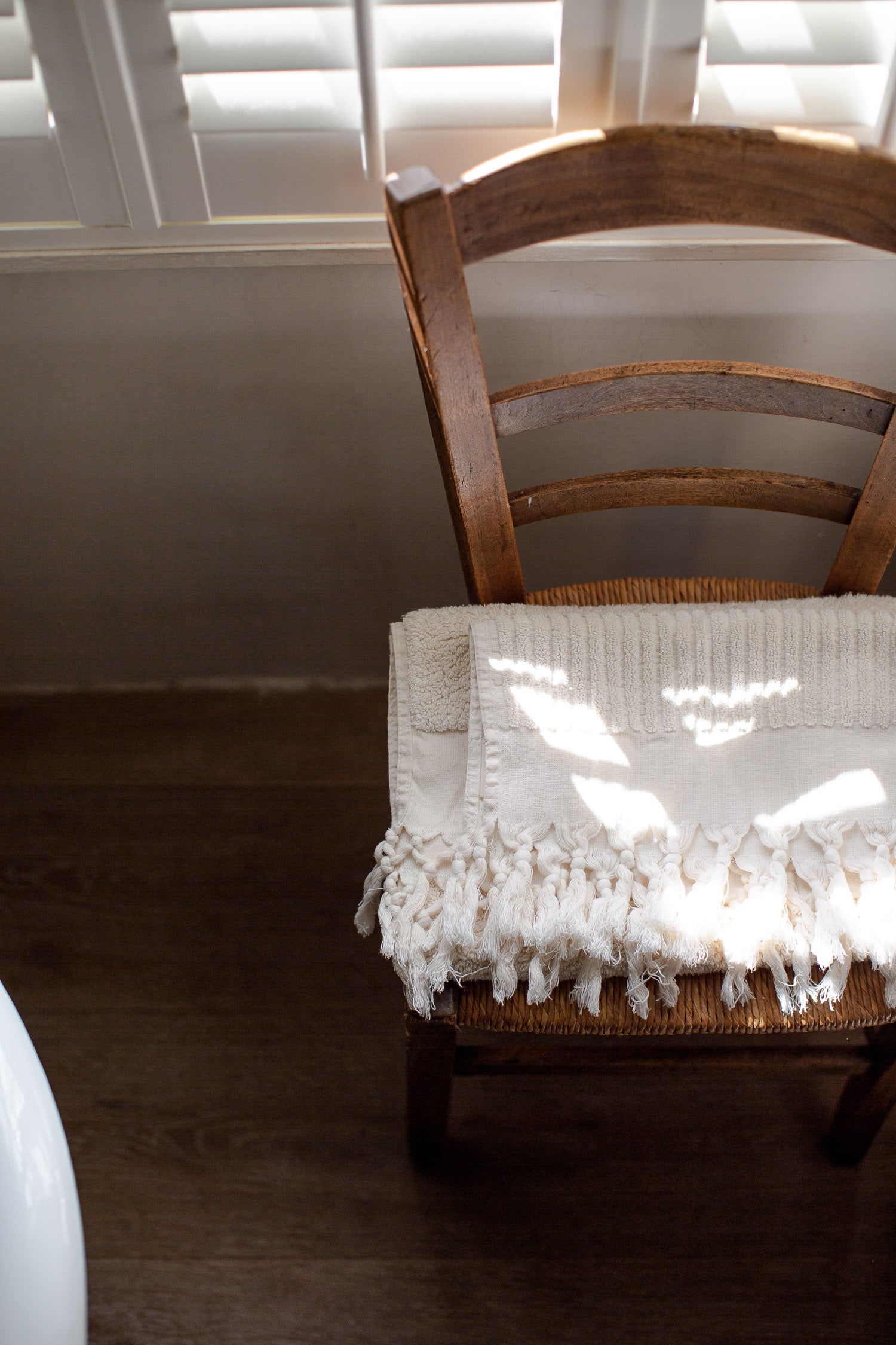 handwoven organic cotton towel with tassels in ecru