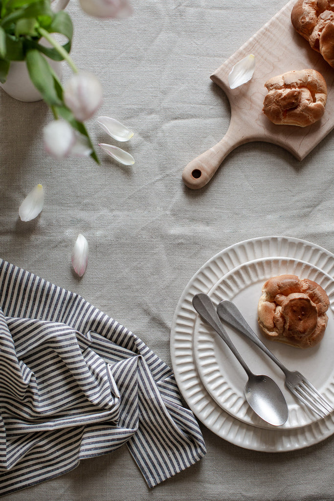 natural breakfast table with linen and stripes 