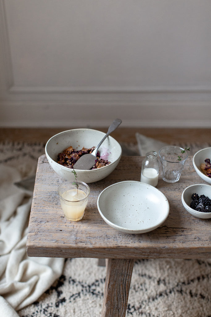 natural breakfast table with handmade ceramics and wood