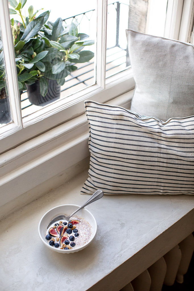 breakfast by a kitchen window seat 