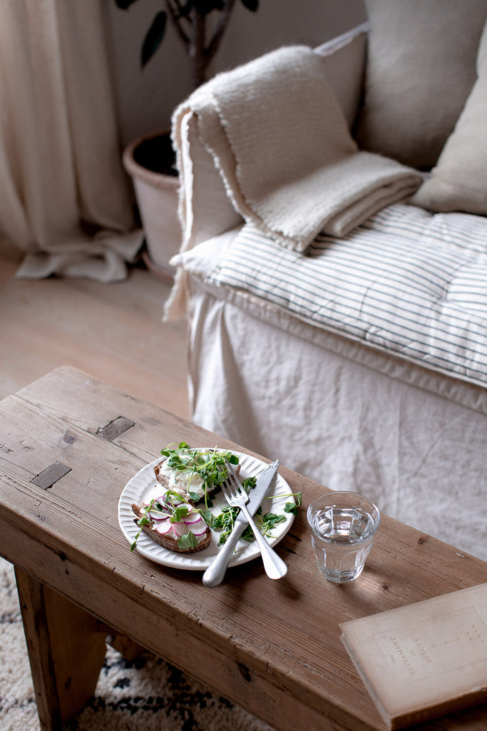 natural home with linen, handmade ceramics, wood and vintage furniture 