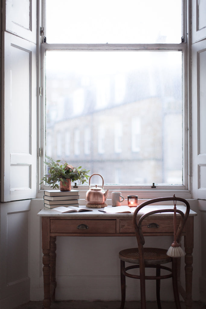 Writing desk by a big window