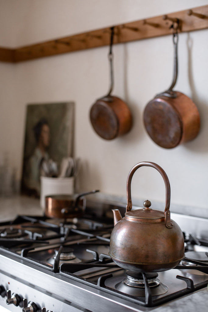 aged copper kettle 