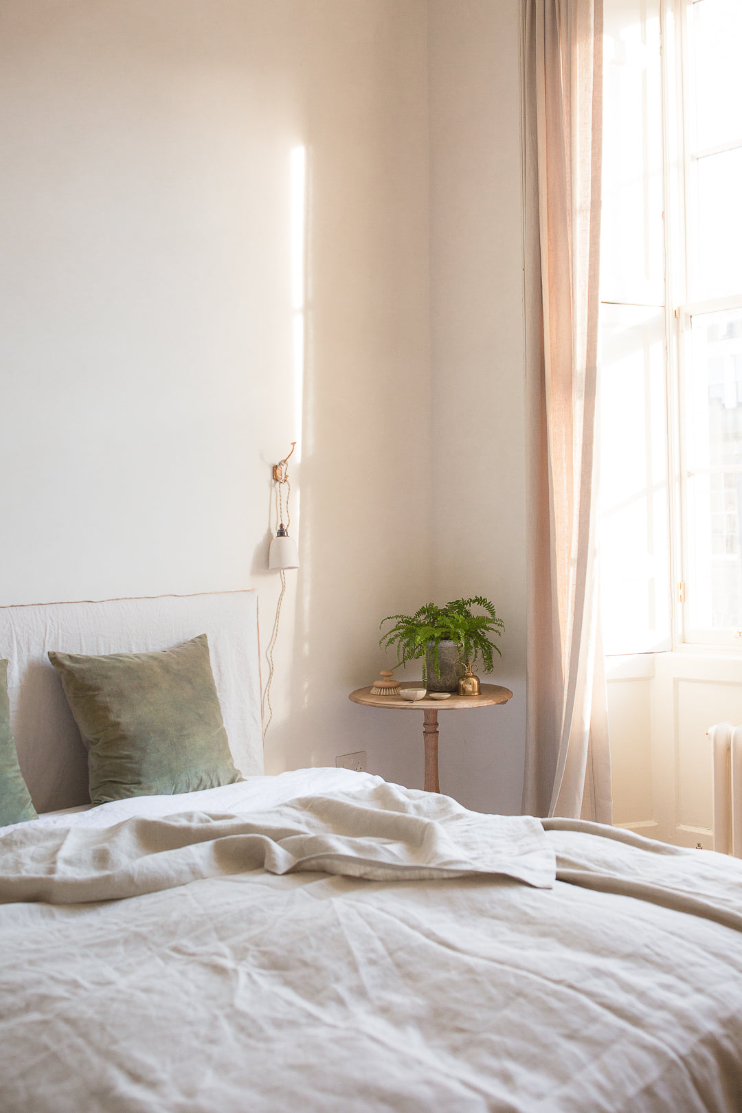 beautiful sunny bedroom with soft comforting decor 