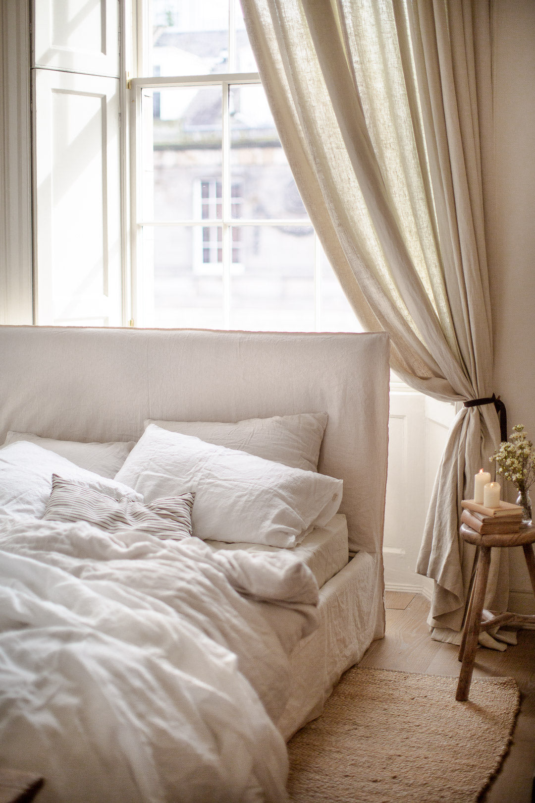 simple neutral bedroom decor with wood and linen