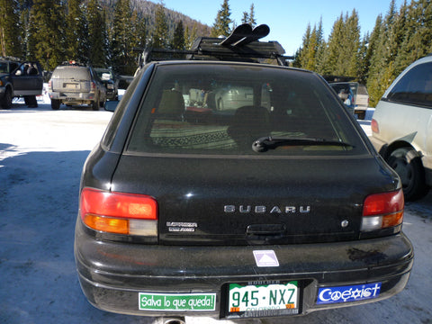 Roof rack skis, snowboards, fat bikes, and rocket boxes