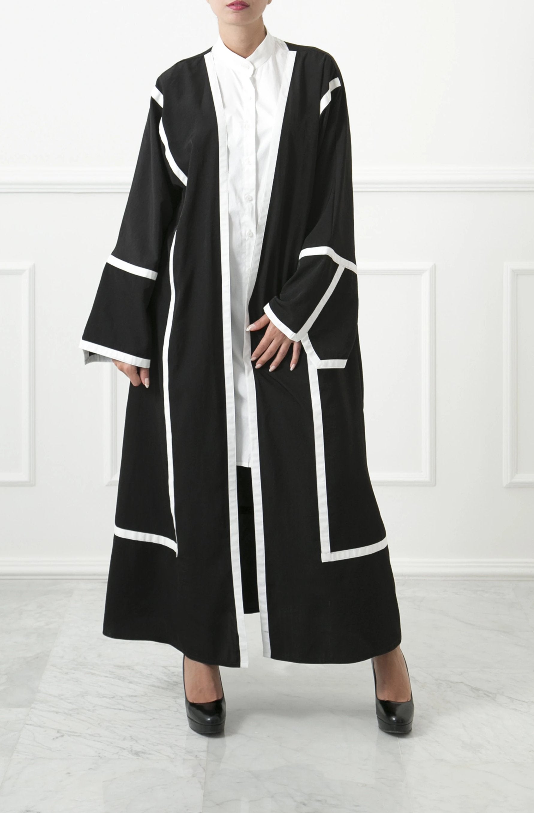 white and black abaya