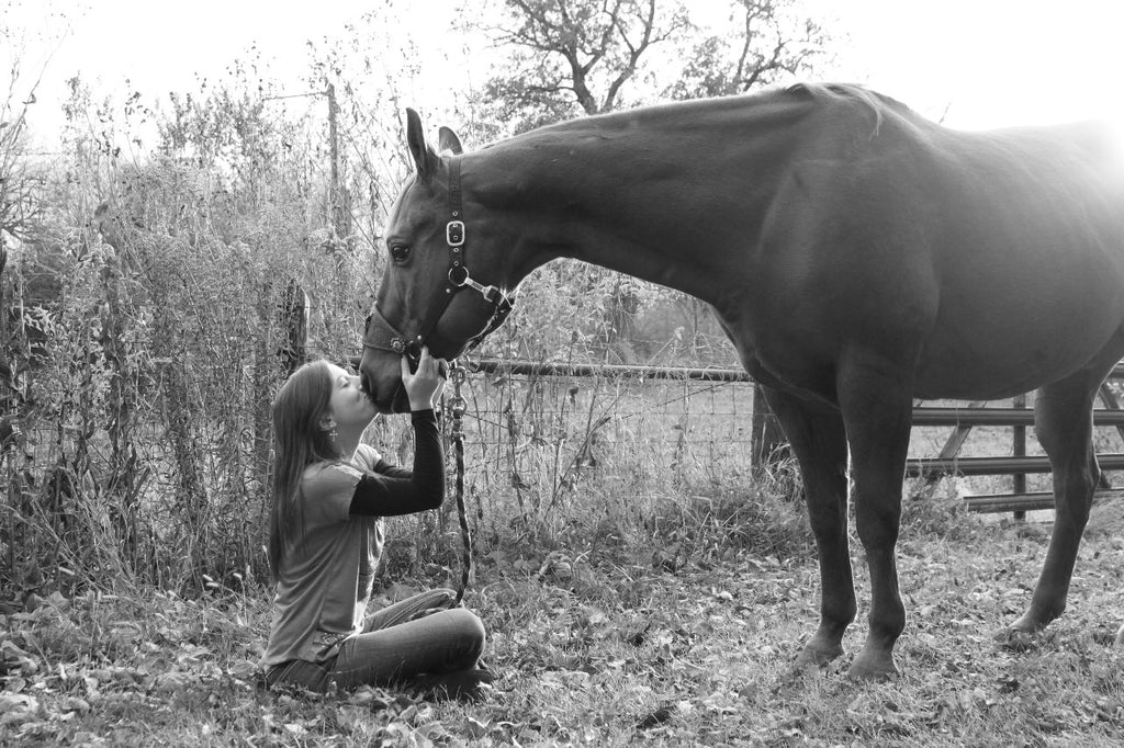 equine therapy: woman with horse