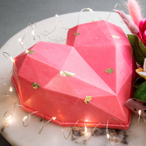 Geometrical shaped pink heart cake