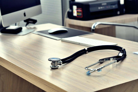 doctors office stethoscope on desk