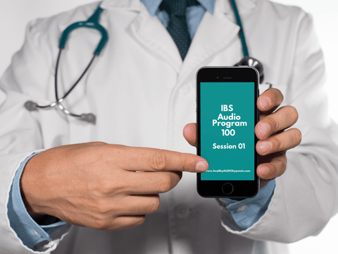 A photo of a male doctor with a stethoscope around his neck, dressed in white coat, holding a mobile phone to the camera. On the screen reads IBS Audio Program 100  session 01 - www.healthyaudiohypnosis.com. The other hand is pointing to the screen