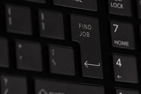 Keyboard with return key marked with find job 