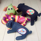 Group of Personalised Red Rufus SockDog Soft Toys