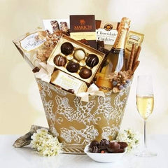 California Chandon Golden  Dazzle and delight someone very special with this sophisticated gift filled with Chandon sparkling wine and sweets. The beautiful holly embossed gold container will take their breath away and features a bottle of California Chandon sparkling wine. 