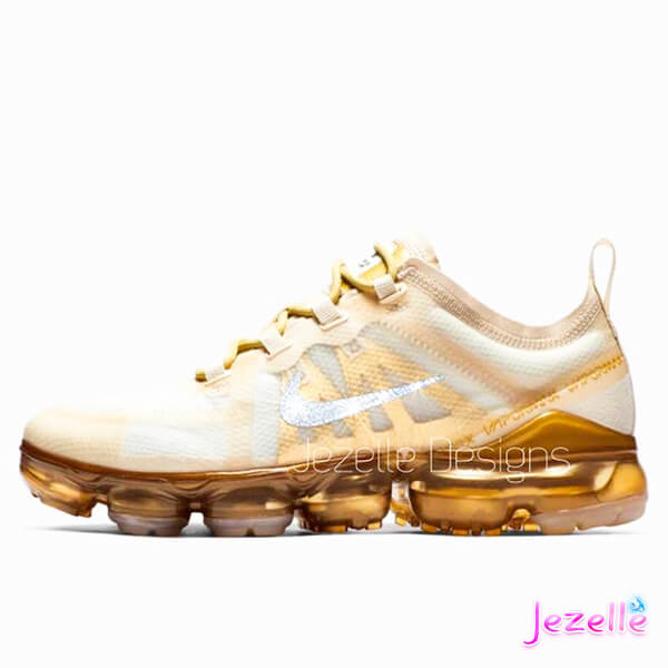 gold and white vapormax