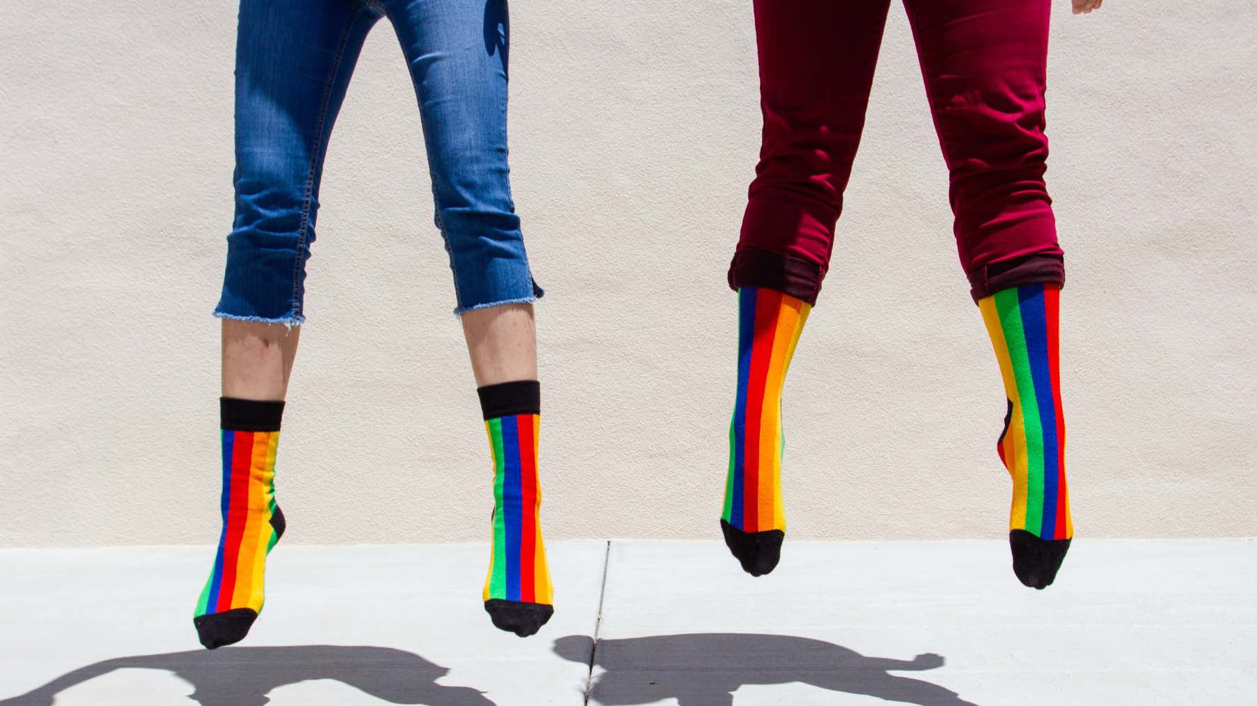 Pride rainbow socks jumping 