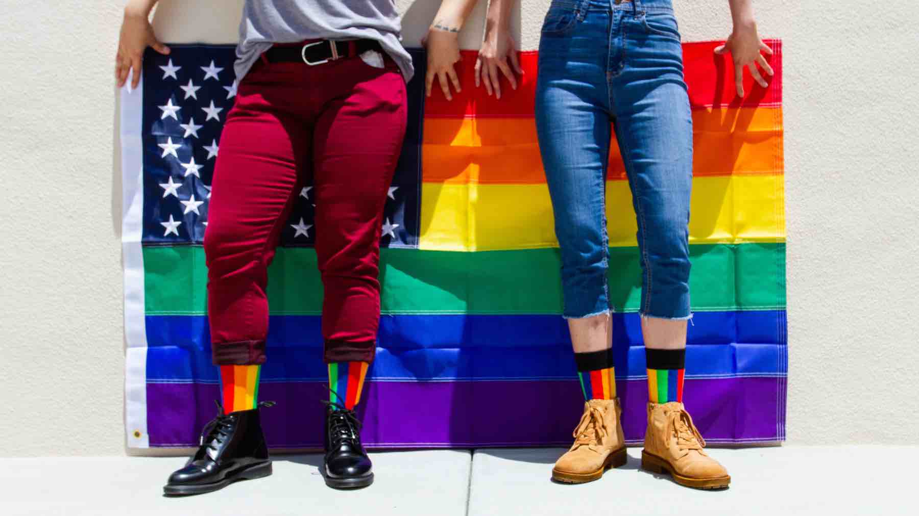 rainbow pride flag wearing rainbow socks