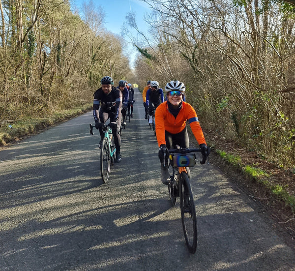 Group of London cyclists riding on the road