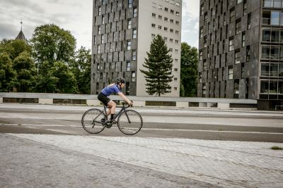 Woman riding road bike in the city