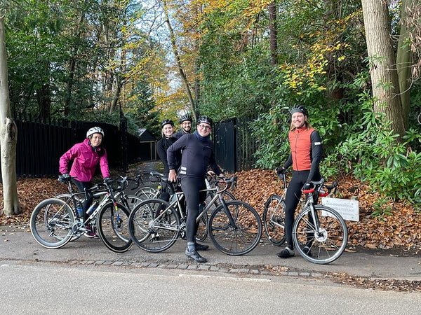 Group of cyclists out riding in winter