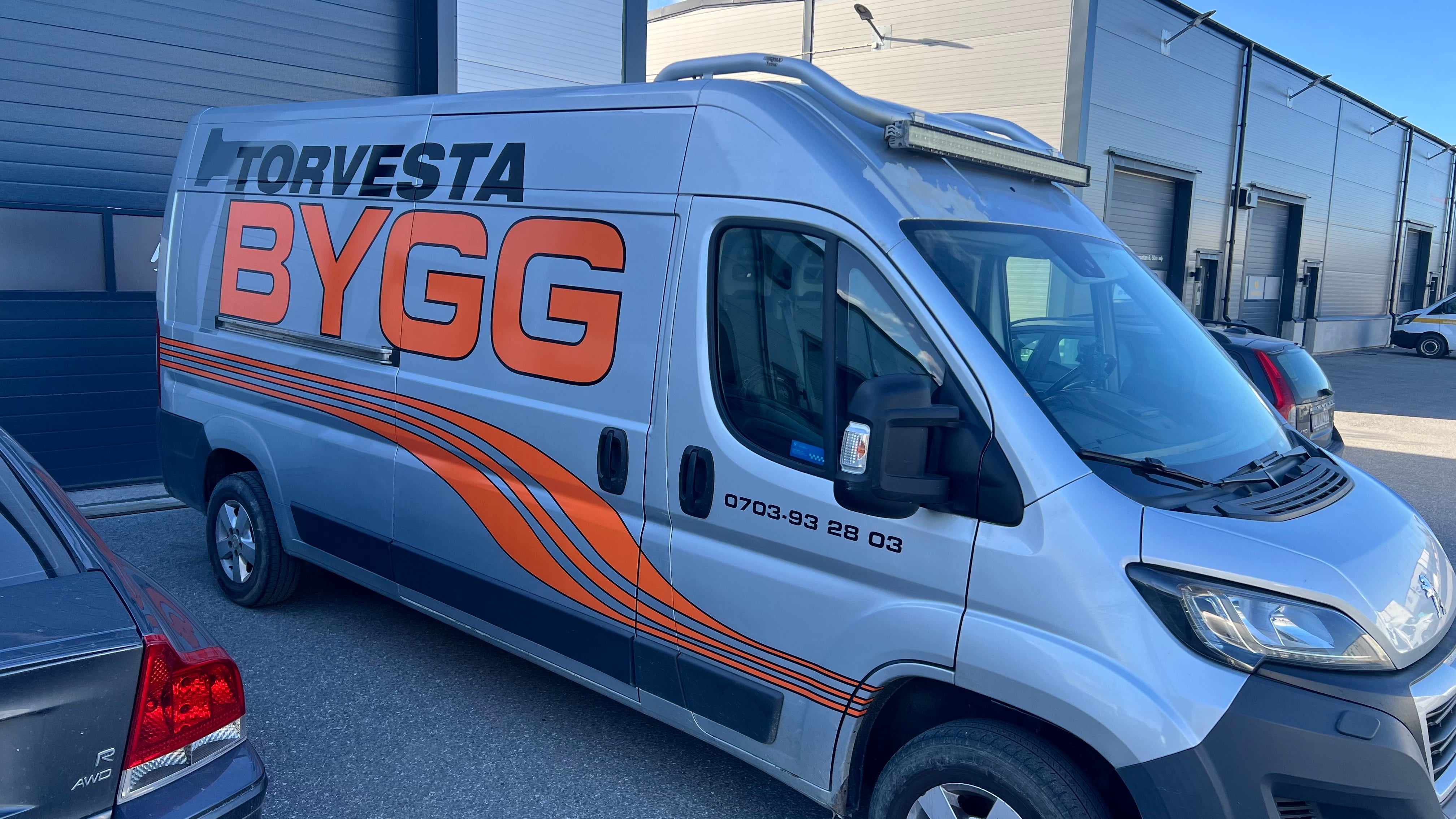 Re-do the decals on the side of this work van after it was resprayed