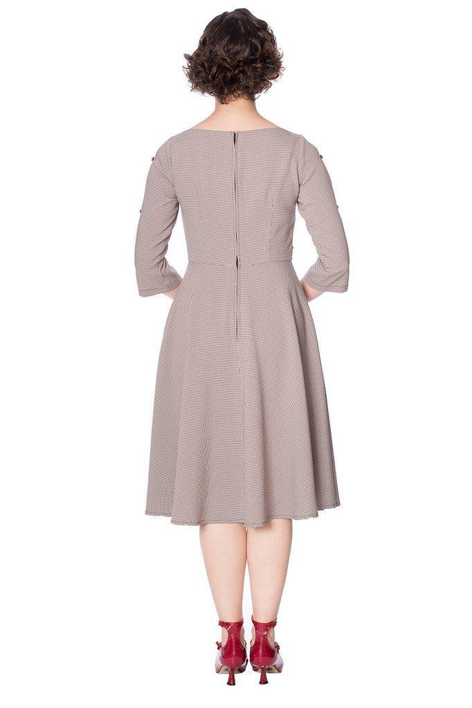 https://cdn.shopify.com/s/files/1/0922/4766/products/the-betty-dress-banned-2_1600x.jpg?v=1581446610