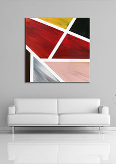 An image of the abstract painting "Geo" above a white couch by Nicole Nicholas Art