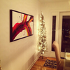 Image of the painting "Inferno" up on a customer's dining room wall