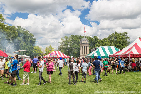 public-festival-with-people-large-gathering-tents-and-pop-up-food-trucks-settled-in-victoria-park