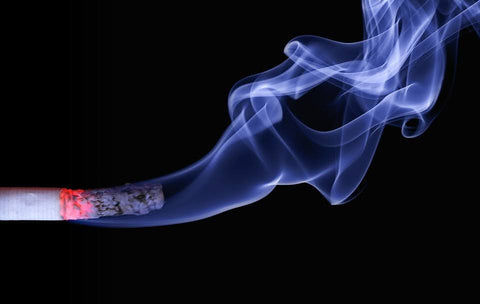 Bone Health as You Age - Light cigarette with smoke