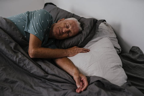 Cardiovascular Health - Older man sleeping in a bed