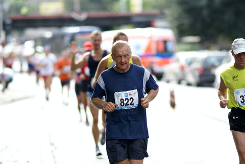 Endurance Products - The Connection Between Gut Health and Aging - Older Man Running