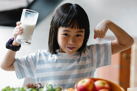 Endurance Products - Kid with Glass of Milk