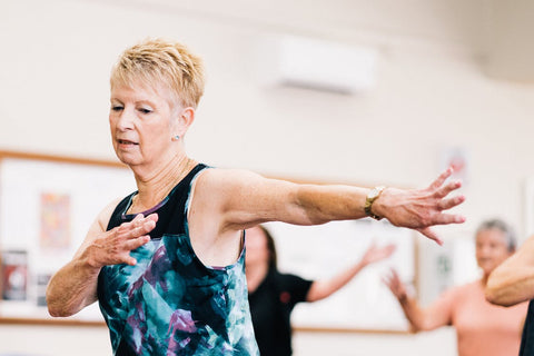 Mental Fitness - Woman in an exercise class