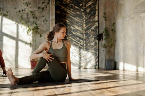 Walking for Wellness - Woman doing yoga pose on a yoga mat