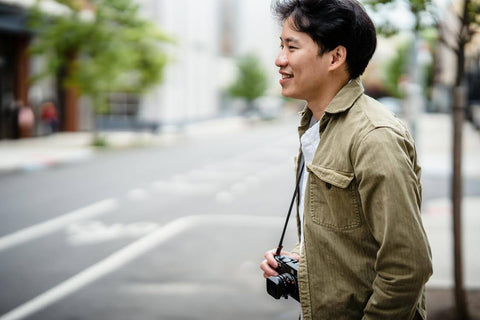 Walking for Wellness - Man standing on a street sidewalk