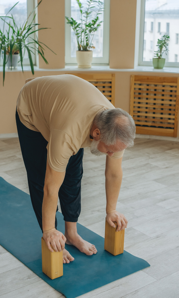 Standing forward bend is an inversion that can increase circulation