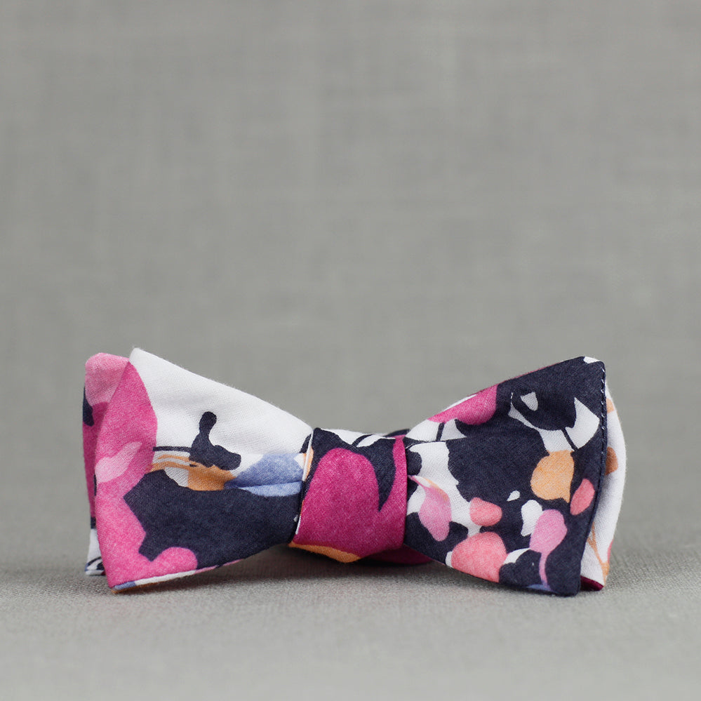 navy and peach bow tie