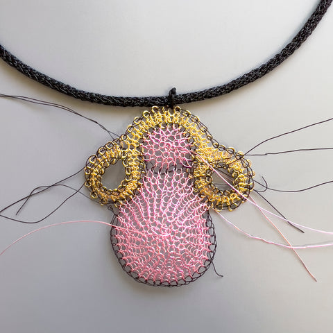 wire crochet pendant figure